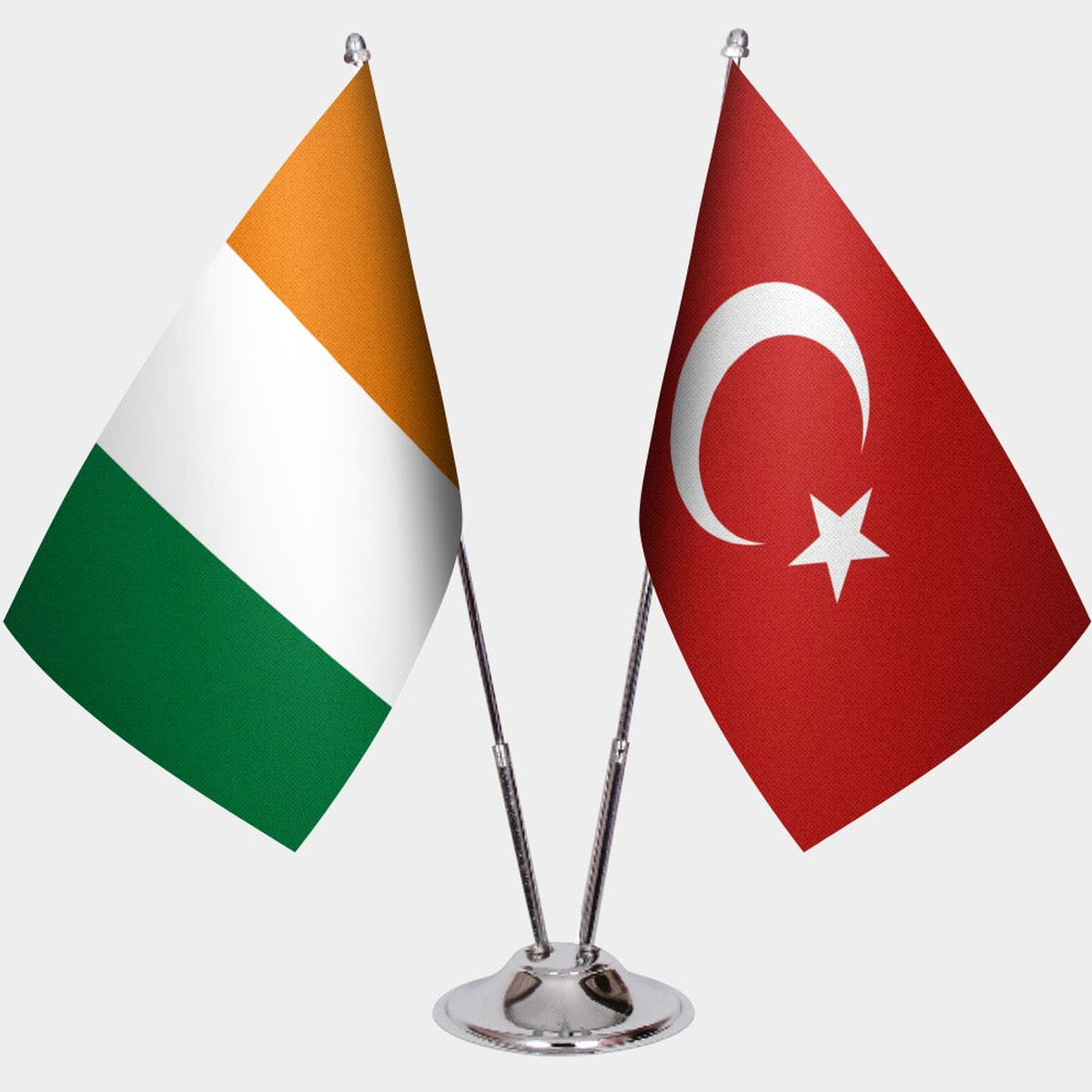 Ivory Coast and Türkiye dual desk flag set with chrome silver pedestal, satin office table flag