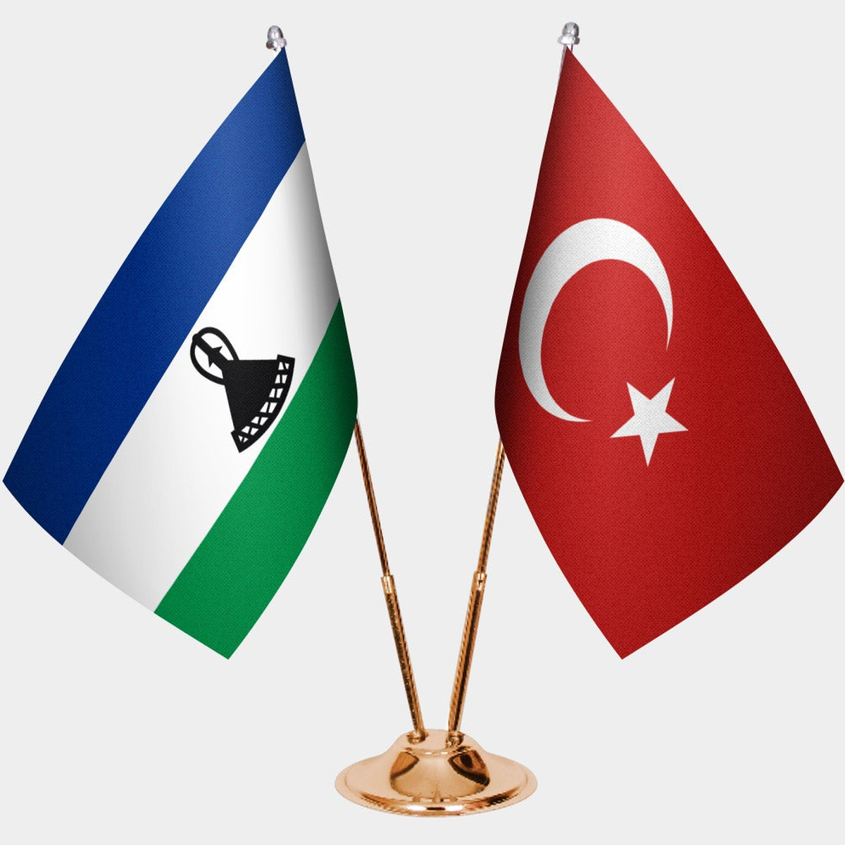 Lesotho and Türkiye dual desk flag set with gold pedestal, satin office table flag