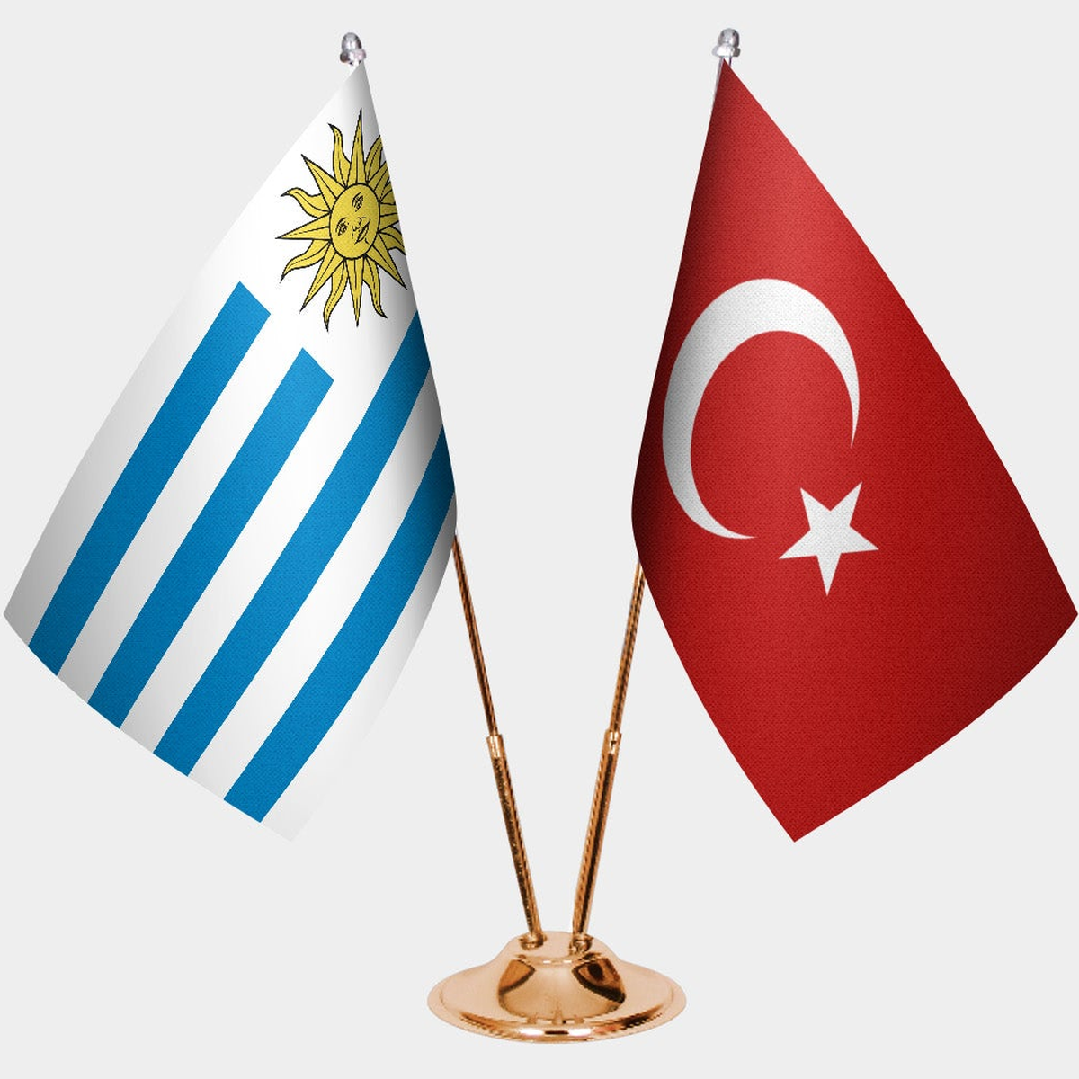 Uruguay and Türkiye dual desk flag set with gold pedestal, satin office table flag