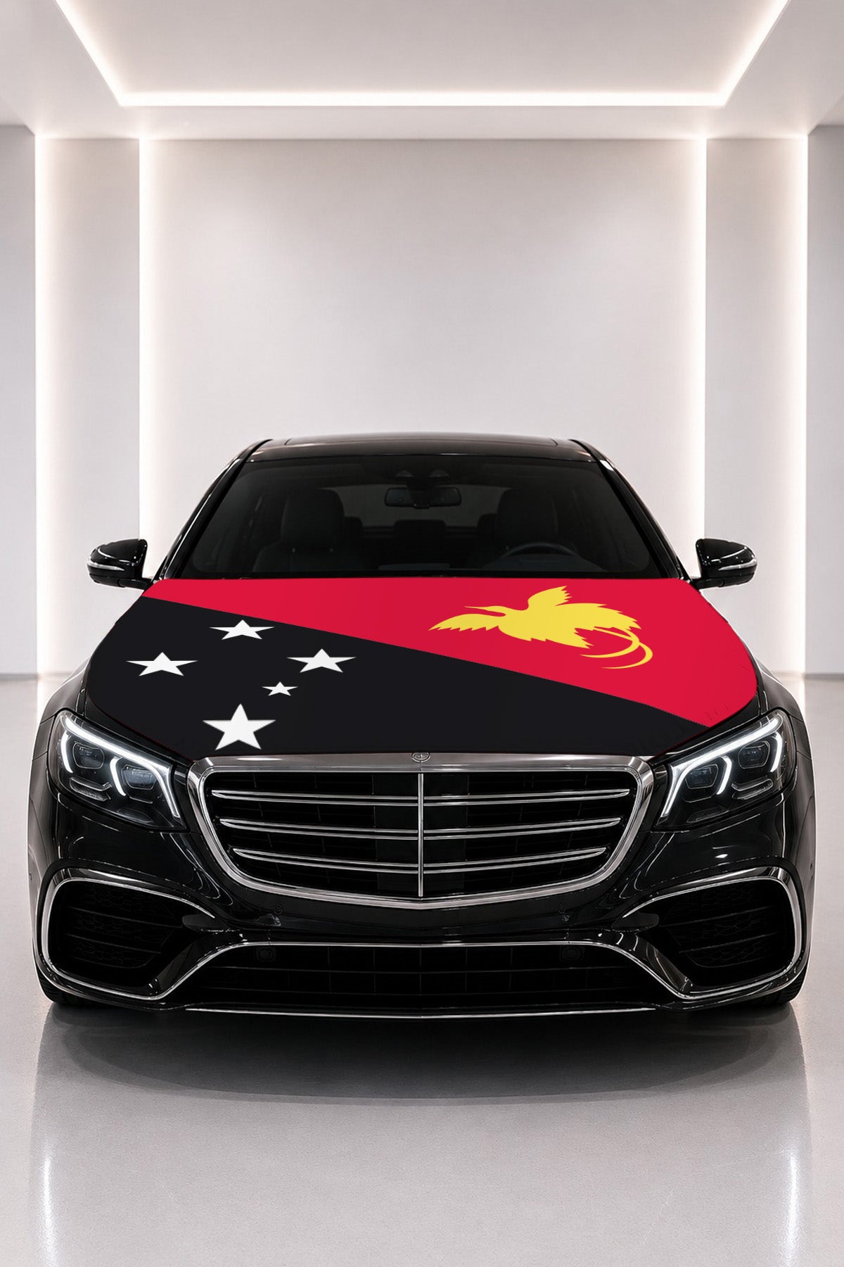 Papua New Guinea flag car hood cover fitted on a black car bonnet