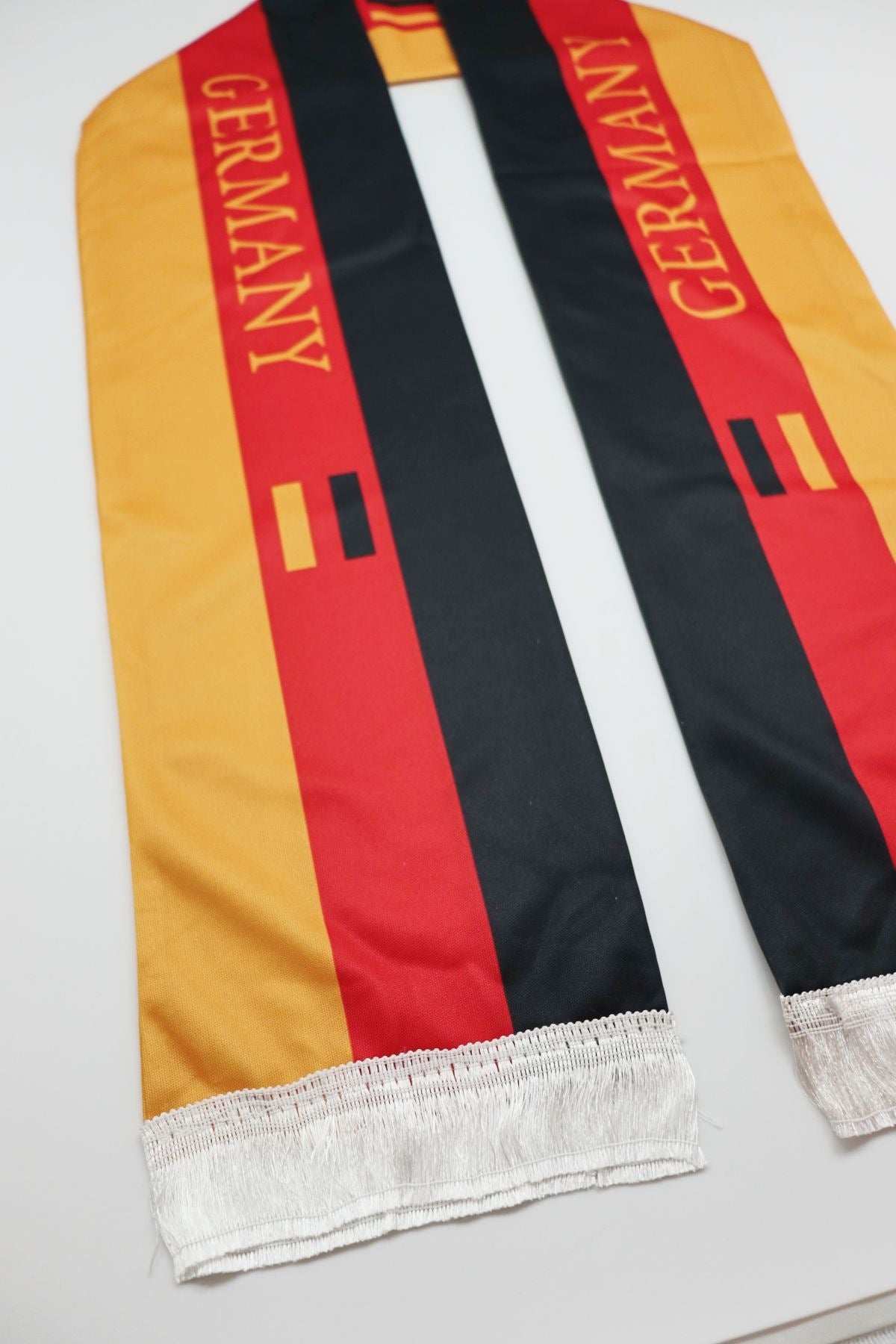 Germany Flag Satin Soccer Scarf detail of the GERMANY lettering and flag print