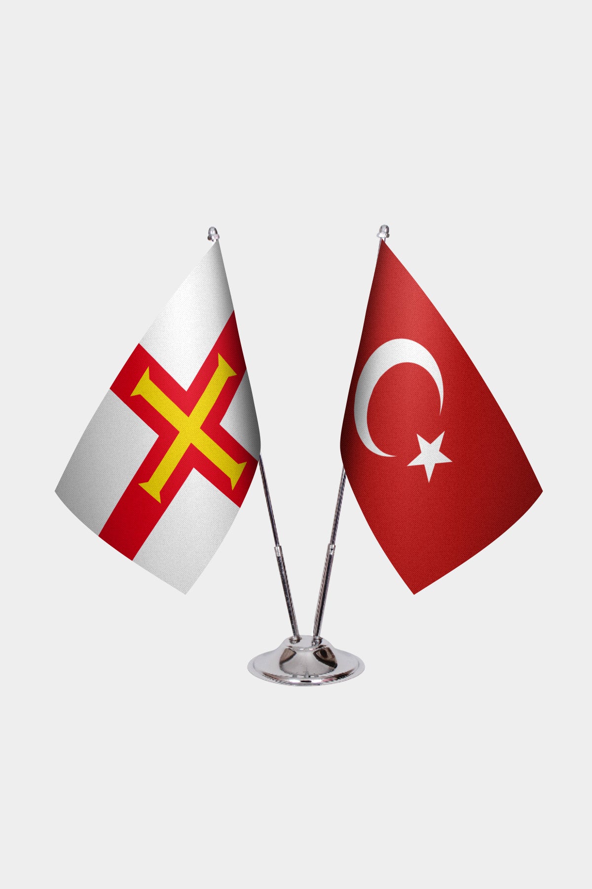 Guernsey and Türkiye dual desk flag set with chrome silver pedestal, satin office table flag