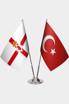 Northern Ireland and Türkiye dual desk flag set with chrome silver pedestal, satin office table flag