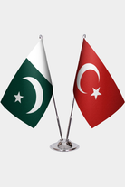 Pakistan and Türkiye dual desk flag set with chrome silver pedestal, satin office table flag