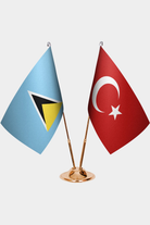 St. Lucia and Türkiye dual desk flag set with gold pedestal, satin office table flag