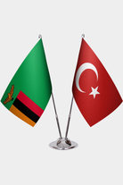 Zambia and Türkiye dual desk flag set with chrome silver pedestal, satin office table flag