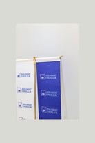 Logo Printed Swallowtail T-Shaped Desk Flag with gold poles, 8 × 32 cm flags on a weighted base (2)