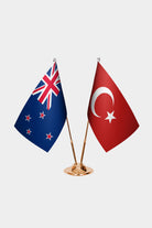 New Zealand and Turkey desk flag set with gold pole and base