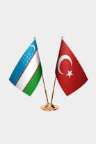 Uzbekistan and Turkey desk flag set with gold pole and base