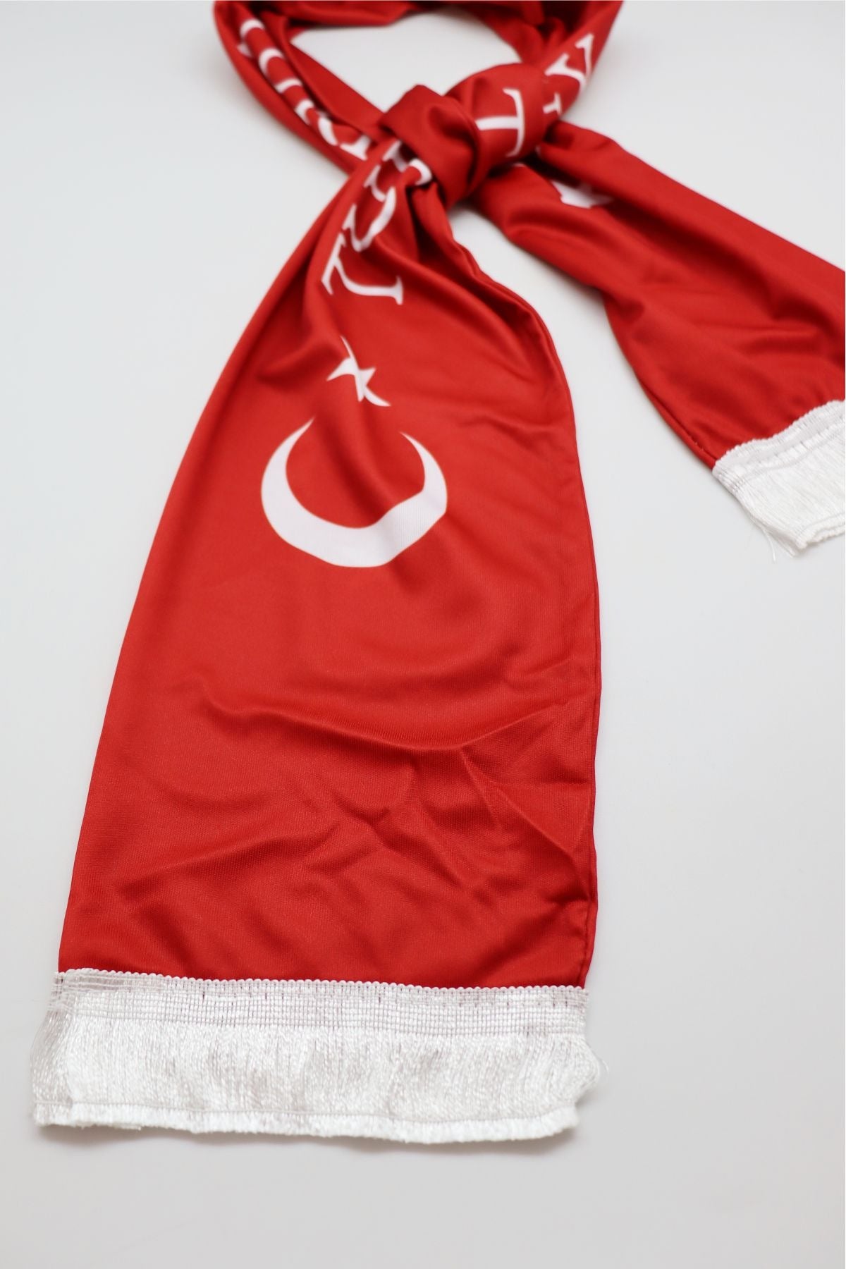 Turkey Flag Satin Soccer Scarf close-up of the satin-look fabric, print and white fringe