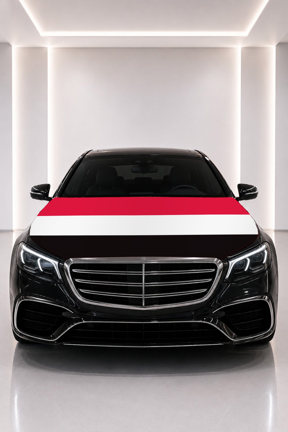 Yemen flag car hood cover fitted on a black car bonnet
